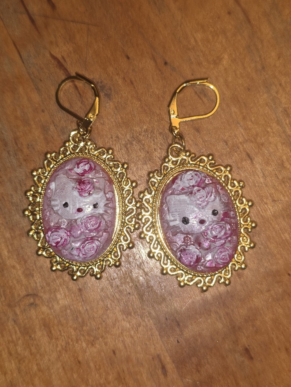 Hello Kitty Cameo Earrings With Floral Accents In Gold Tone Leverback Earrings